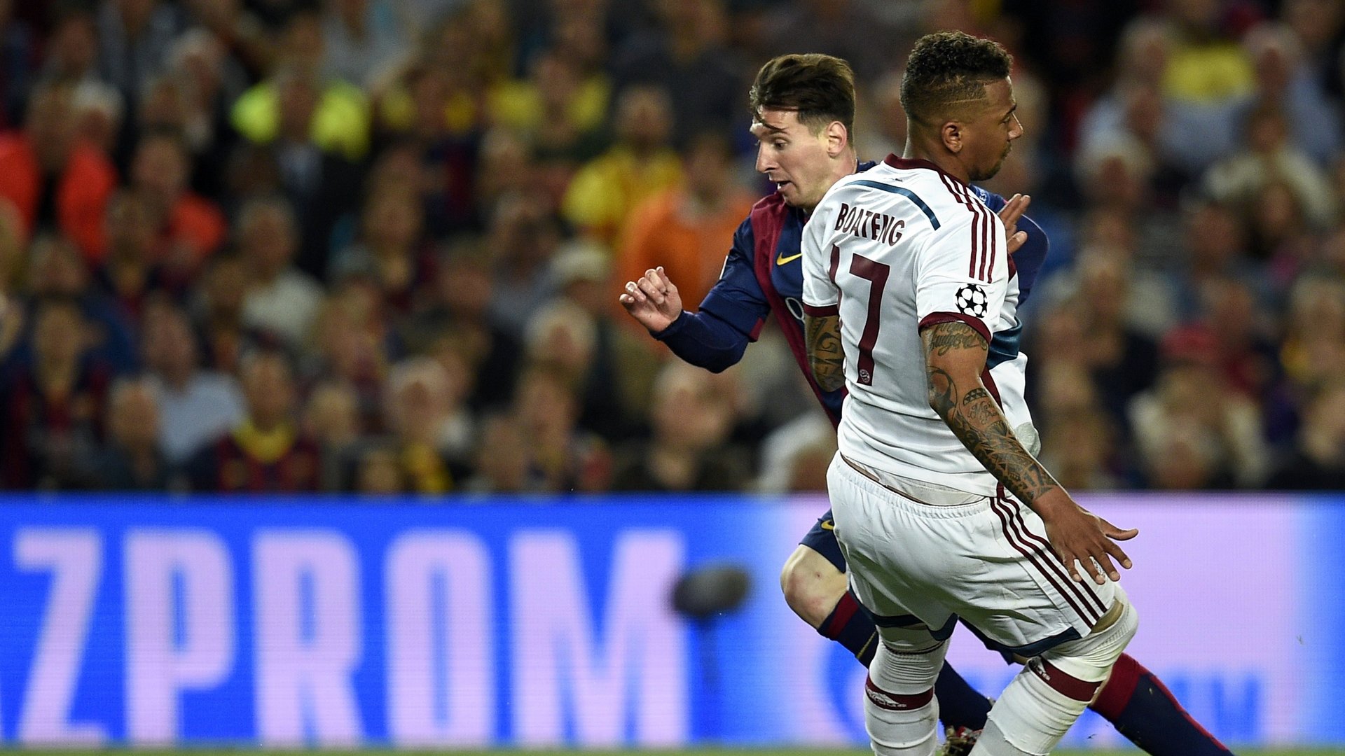 Barcelona's Argentinian forward Lionel Messi (L) vies with Bayern Munich's defender Jerome Boateng (R) during the UEFA Champions League football match FC Barcelona vs FC Bayern Muenchen at the Camp Nou stadium in Barcelona on May 6, 2015. AFP PHOTO/ LLUIS GENE (Photo credit should read LLUIS GENE/AFP/Getty Images)